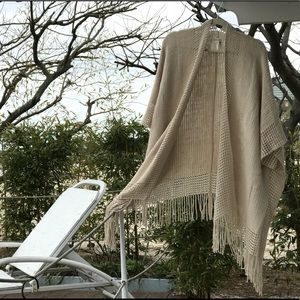 Ivory fringed cape